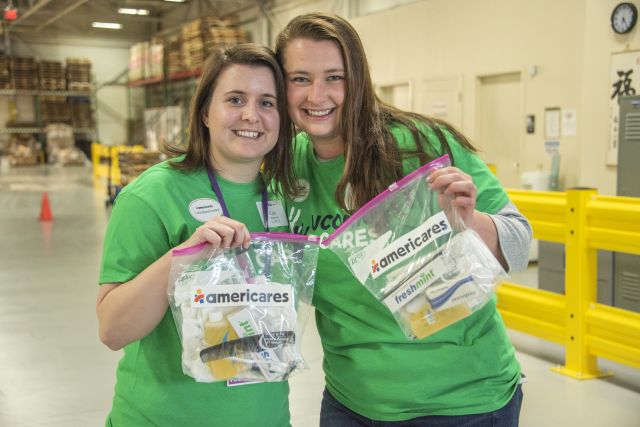 UConn Fairfield Alumni network Volunteer at Americares UConn Volunteers at kitting event