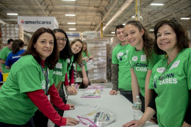 UConn Alumni in National Volunteer Week at Americares UConn Volunteers preparing emergency kits at Americares HQ