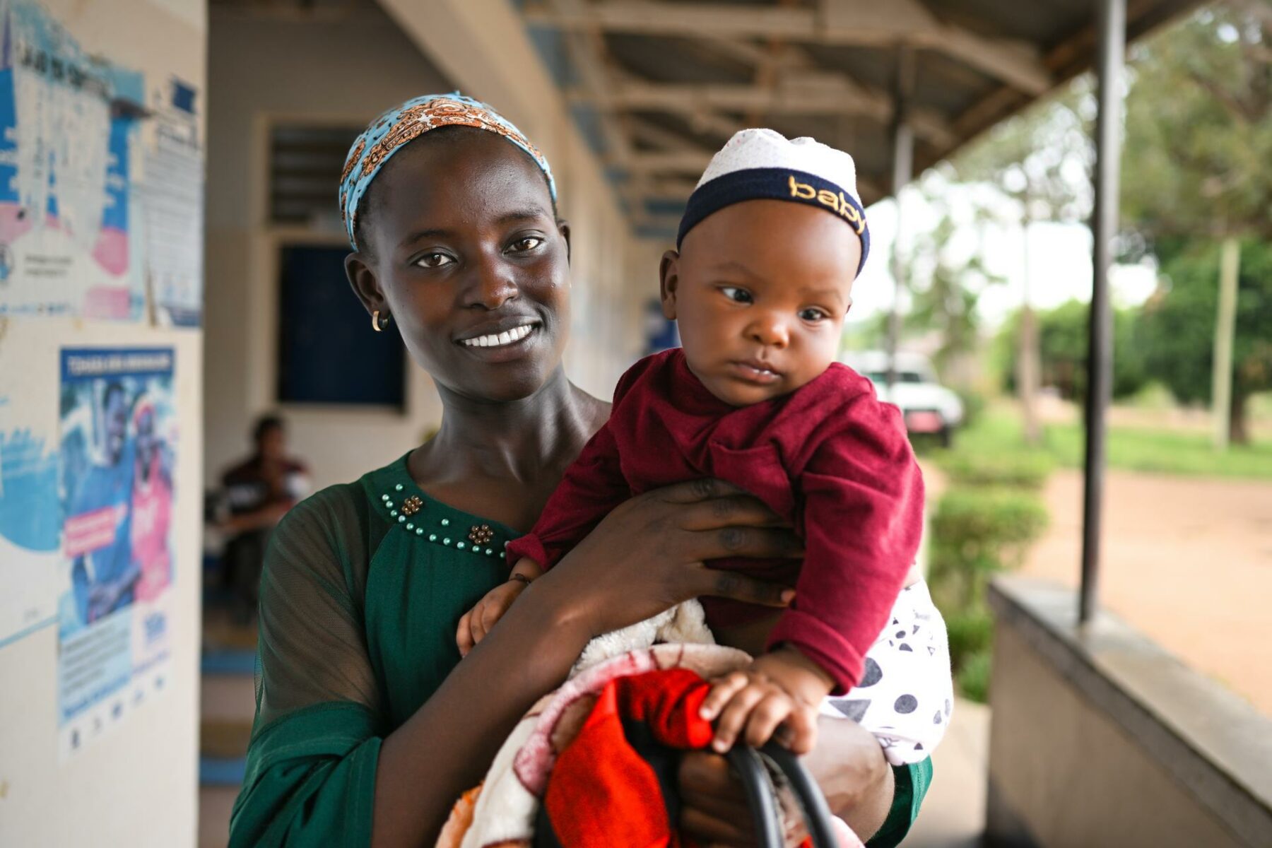 Tanzania woman holding her baby.