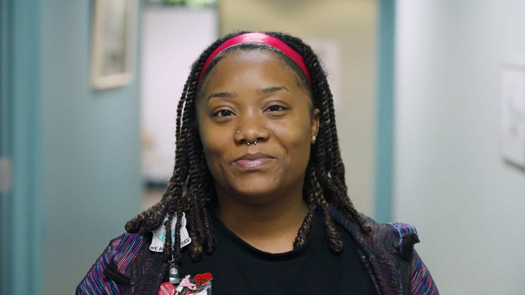 Young woman smiling.