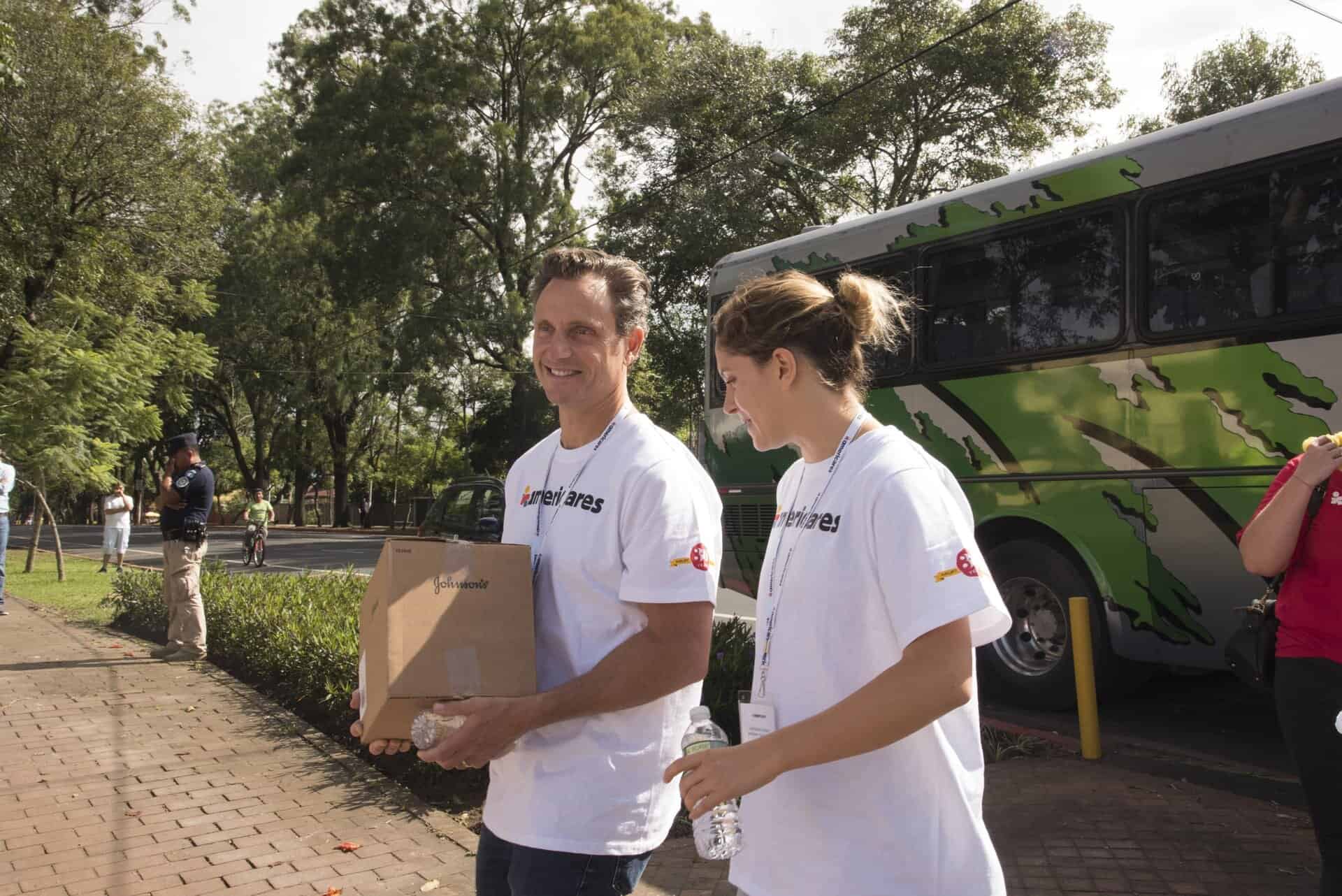 Tony Goldwyn (left) and his daughter Tess (right) arrive at a children’s home in Guatemala